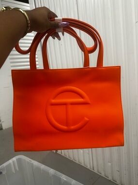 Telfar Neon Orange Embossed Logo Tote